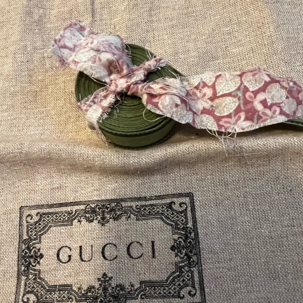 Free w purchase Gucci ribbon and dust bag